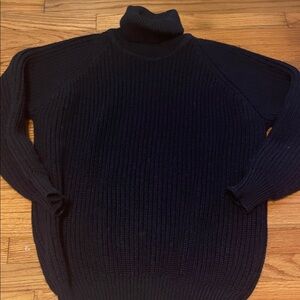 Aran Crafts Elegant Blue Turtleneck Sweater